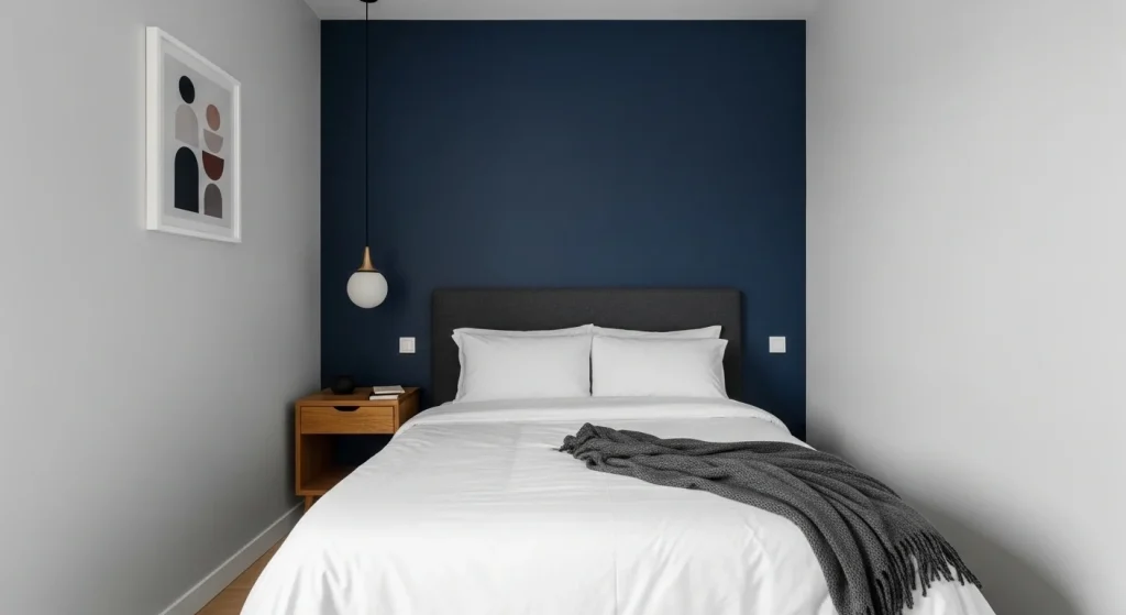 navy wall small apartment bedroom idea for men
